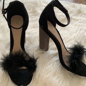 Furry black gem heels